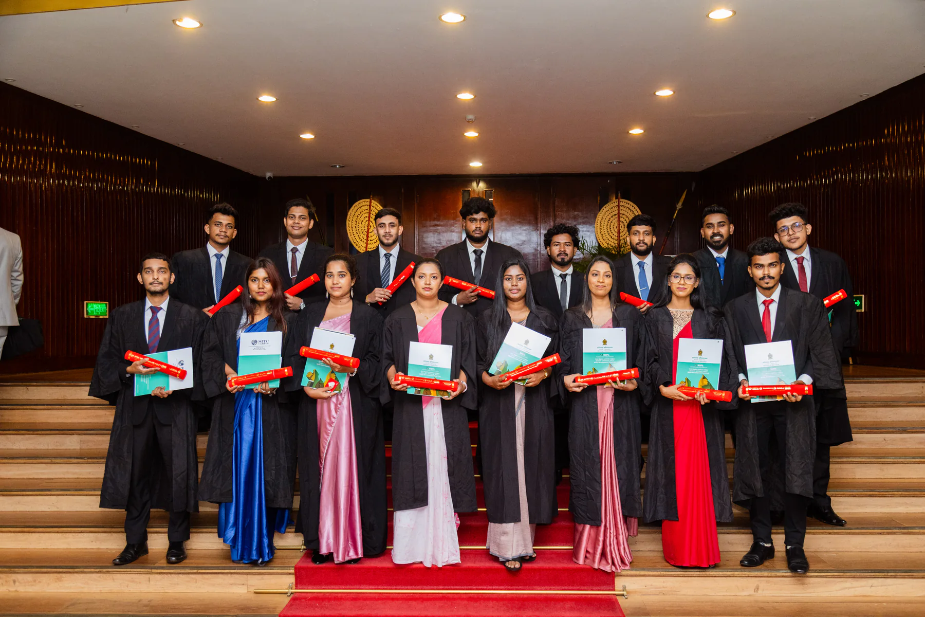 Graduates gathered for a formal group photograph