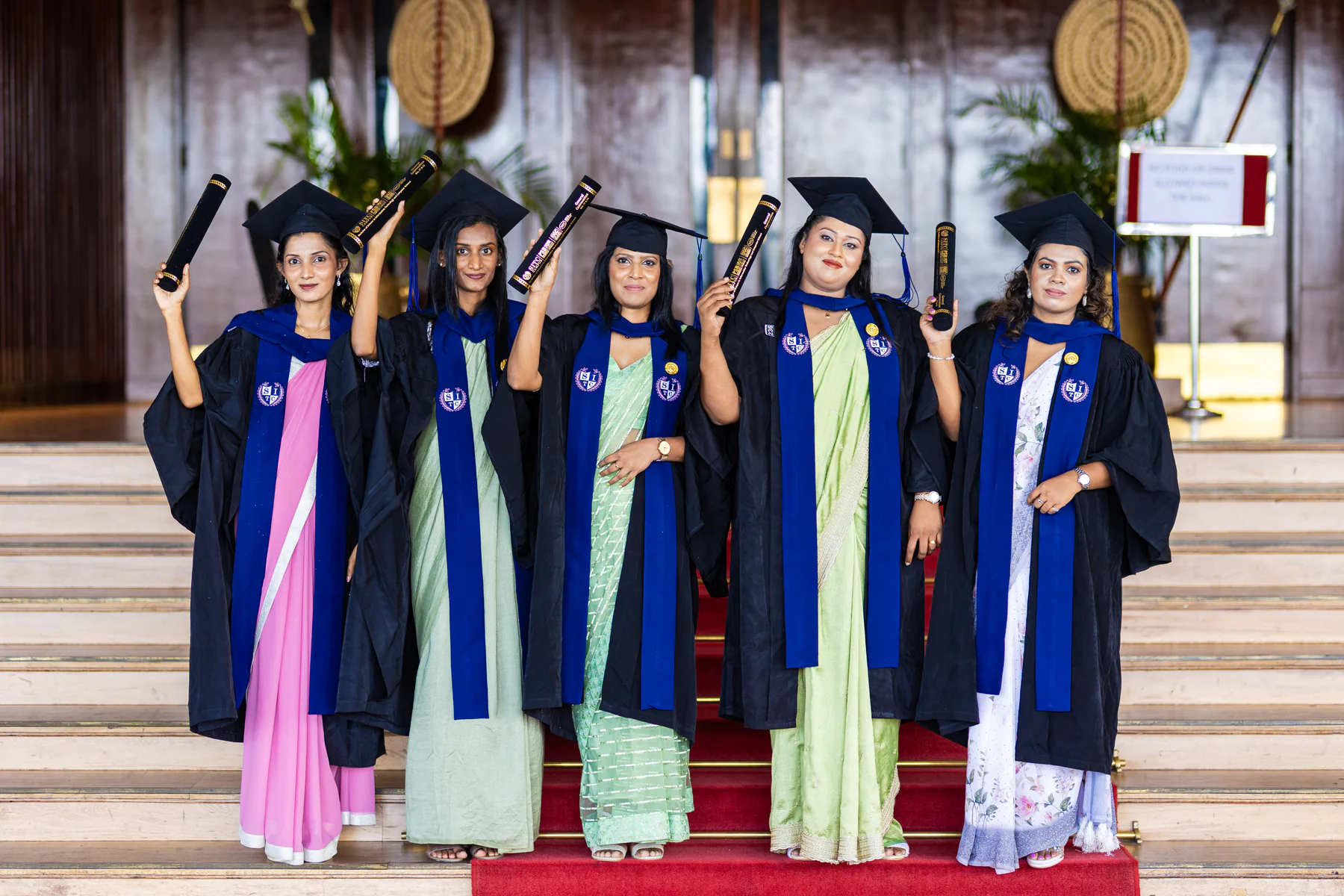 CCA graduates celebrating together after the ceremony