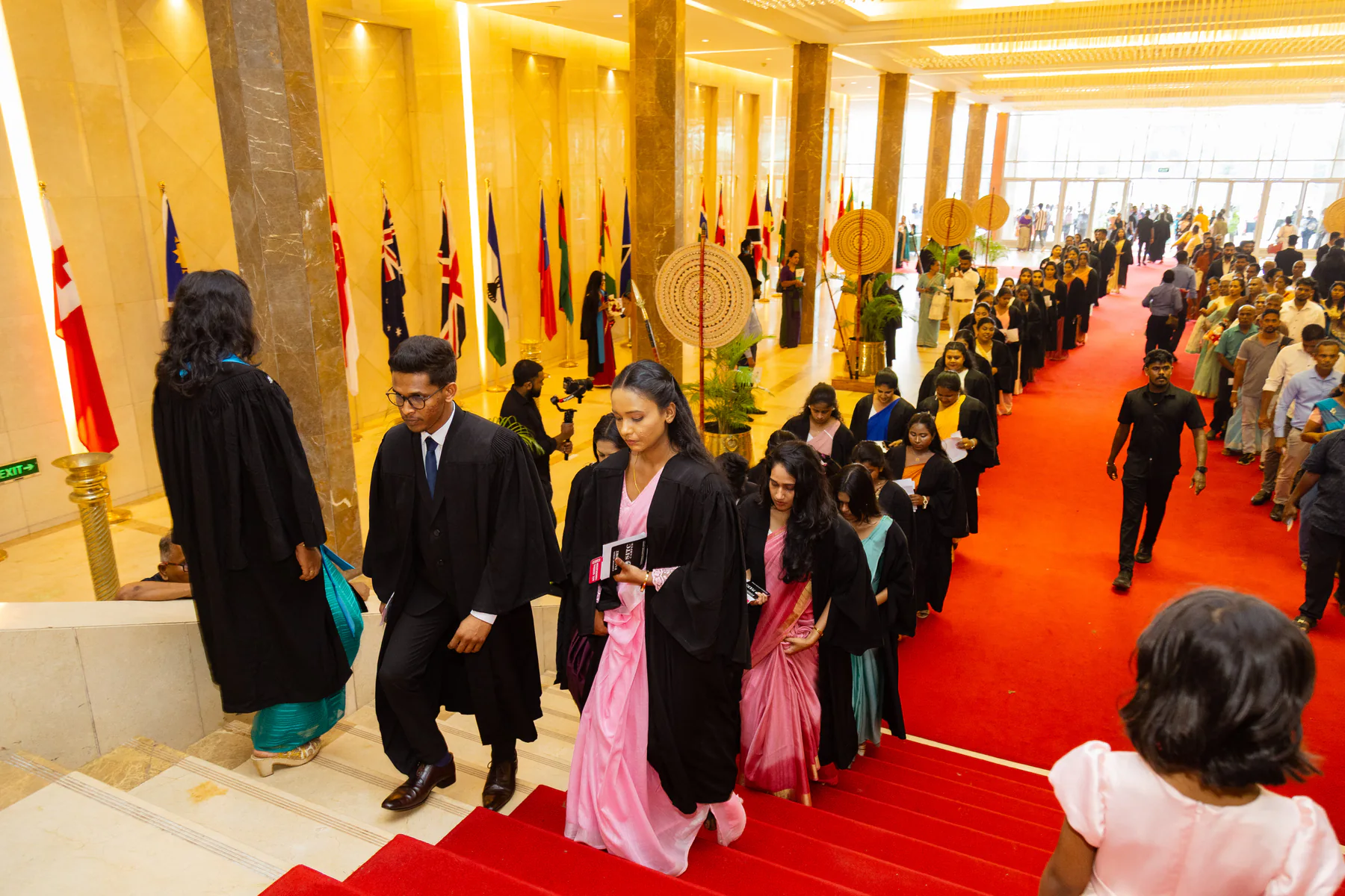 Graduates and academic representatives arriving for the convocation ceremony